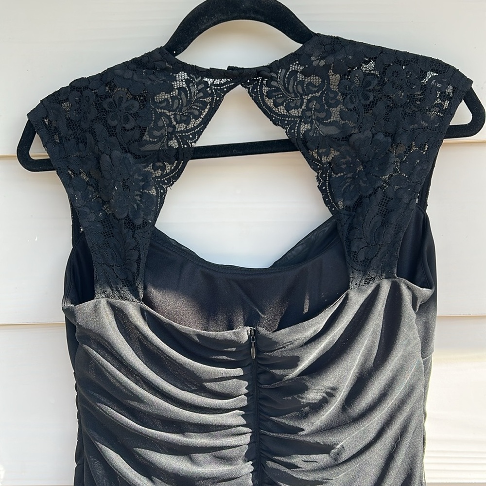 Elegant XScape Black dress with lace and rousing size 14